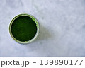 Closeup of can of fresh matcha powder, green tea powder. 139890177