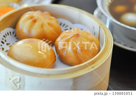 fried dough , deep fried dough or Chinese sweetmeat or bun or fried bun fried dough , deep fried dough or Chinese sweetmeat or bun or fried bun 139891051