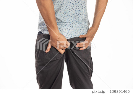 Hemorrhoidal pain, man with hemorrhoids on white background. 139891460
