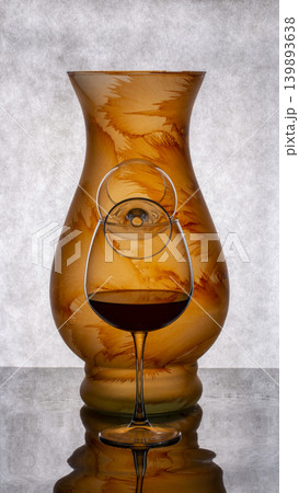 Still life with glass objects on a gray background Still life with glass objects on a gray background 139893638