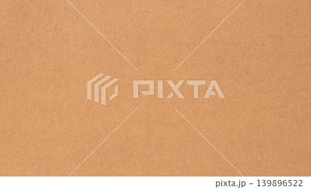 Brown kraft paper texture background with natural recycled cardboard surface Brown kraft paper texture background with natural recycled cardboard surface 139896522
