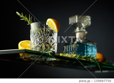 Cold refreshing drink with lemon and rosemary. Cold refreshing drink with lemon and rosemary. 139897750