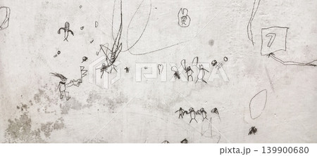 Children's pencil scribbles and drawings on a wall Children's pencil scribbles and drawings on a wall 139900680