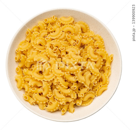 Dried macaroni cockerel scallops. Pasta in a ceramic bowl isolated on a white background. 139900923