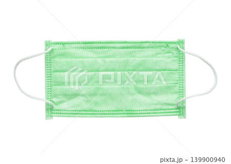 Protective green medical face mask isolated on white background. Protective green medical face mask isolated on white background. 139900940