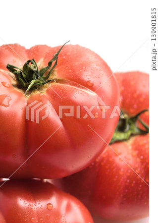 Close Up Fresh Tomatoes On White Background Close Up Fresh Tomatoes On White Background 139901815