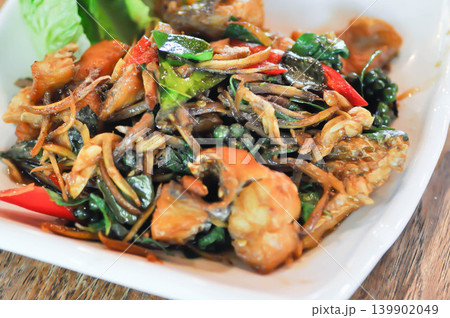 stir fried fish , stir fried bass or stir fried Sea bass fish with pepper and Chinese key or lesser ginger or spicy fish stir fried fish , stir fried bass or stir fried Sea bass fish with pepper and Chinese key or lesser ginger or spicy fish 139902049