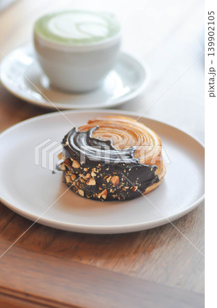 timber ring or chocolate timber ring or bread or round croissant and matcha latte timber ring or chocolate timber ring or bread or round croissant and matcha latte 139902105