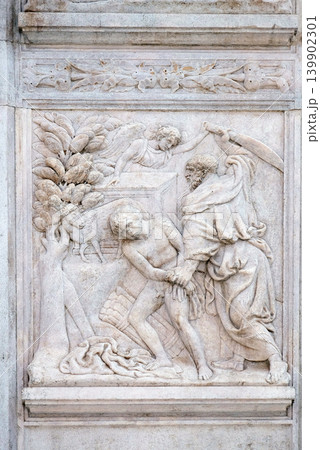 Abraham Sacrificing Isaac, relief on portal of Saint Petronius Basilica in Bologna, Italy 139902301