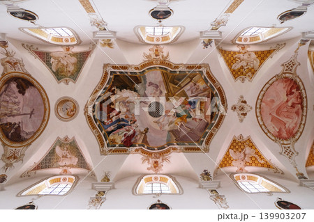 Frescoes on the ceiling of the monastery church of St. John in Ursberg, Germany Frescoes on the ceiling of the monastery church of St. John in Ursberg, Germany 139903207