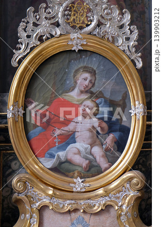 Virgin Mary with baby Jesus, altarpiece in the monastery church of St. John in Ursberg, Germany 139903212
