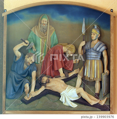 11th Stations of the Cross, Crucifixion: Jesus is nailed to the cross, Church of the Blessed Aloysius Stepinac in Budasevo, Croatia 11th Stations of the Cross, Crucifixion: Jesus is nailed to the cross, Church of the Blessed Aloysius Stepinac in Budasevo, Croatia 139903976