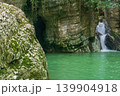 Waterfall and lake in canyon in tropical forest 139904918