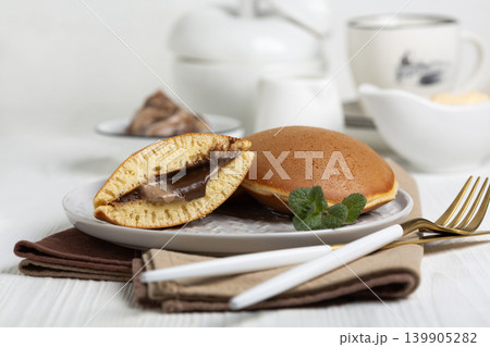 Japanese dorayaki pancakes with a sprig of mint. 139905282