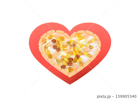 Cardiovascular health concept with pharmaceutical tablets and gel caps. 139905340