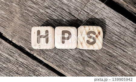 HPS Hantavirus Pulmonary Syndrome on a cube or wooden block. health concept HPS Hantavirus Pulmonary Syndrome on a cube or wooden block. health concept 139905942
