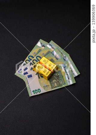 Gold bars or ingots as a tool for balance, financial investment, and savings. Gold bars Gold bars or ingots as a tool for balance, financial investment, and savings. Gold bars 139906369