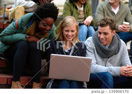College, students and laptop on stairs outdoor for research, relax or break on campus with social media. University, friends or smile with technology for internet, streaming or learning and diversity College, students and laptop on stairs outdoor for research, relax or break on campus with social media. University, friends or smile with technology for internet, streaming or learning and diversity 139906570