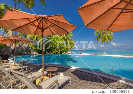 Luxury resort sunbeds umbrellas poolside carefree relaxing spa stunning breathtaking dreamy serene paradise exotic coastal tropical destination summer vacation idyllic lifestyle tranquil sunshine Luxury resort sunbeds umbrellas poolside carefree relaxing spa stunning breathtaking dreamy serene paradise exotic coastal tropical destination summer vacation idyllic lifestyle tranquil sunshine 139906598