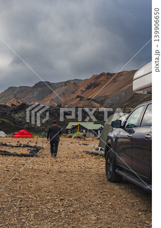 Campsite with Tents and SUV in Rugged Icelandic Landscape Campsite with Tents and SUV in Rugged Icelandic Landscape 139906650