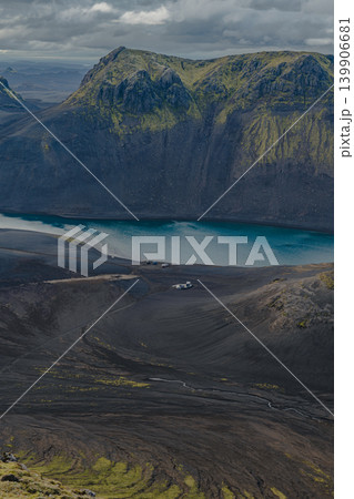 Turquoise Lake Amid Basaltic Hills in Volcanic Icelandic Landscape 139906681