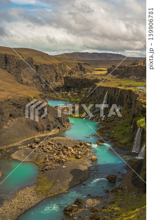 Turquoise River Winding Through Rugged Canyon in Iceland 139906781