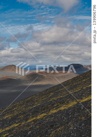 Volcanic Terrain with Moss and Reddish Brown Hills in Iceland Volcanic Terrain with Moss and Reddish Brown Hills in Iceland 139906796