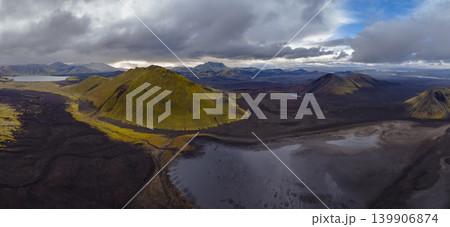 Aerial View of Moss Covered Volcanic Hill in Iceland's Rugged Terrain 139906874