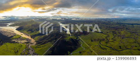 Aerial View of Iceland's River, Volcanic Hills, and Green Valleys Aerial View of Iceland's River, Volcanic Hills, and Green Valleys 139906893