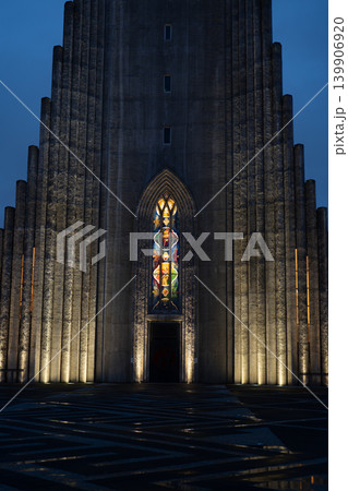 Illuminated Hallgrimskirkja Facade with Stained Glass Window at Night Illuminated Hallgrimskirkja Facade with Stained Glass Window at Night 139906920