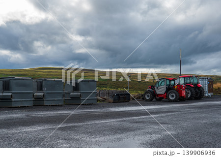 Gravel Lot with Waste Containers and Tractors in Rural Iceland 139906936