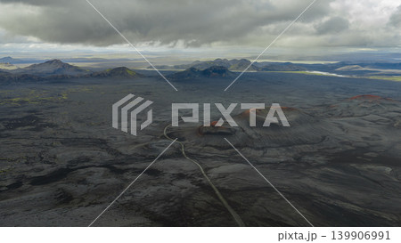 Aerial View of Iceland's Volcanic Landscape with Craters and Road Aerial View of Iceland's Volcanic Landscape with Craters and Road 139906991