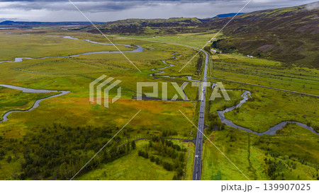 Aerial View of a Powerful Waterfall in Iceland's Volcanic Landscape 139907025