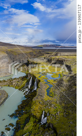 Aerial View of Cascading Waterfalls and Turquoise River in Iceland Aerial View of Cascading Waterfalls and Turquoise River in Iceland 139907117