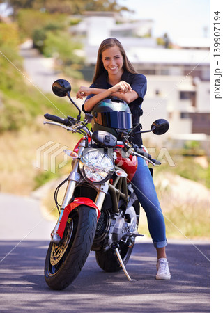 Portrait, road trip and outdoor with woman, motorbike and extreme sports with helmet and smile. Face, person and girl with transport and travel with adventure and journey with rider, joyful or safety Portrait, road trip and outdoor with woman, motorbike and extreme sports with helmet and smile. Face, person and girl with transport and travel with adventure and journey with rider, joyful or safety 139907194