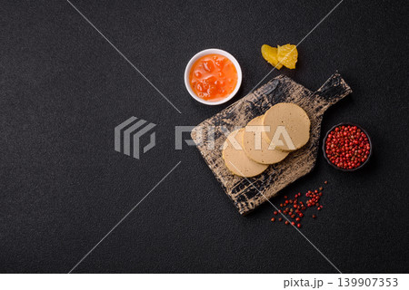 Foie gras, sliced chicken liver with fruit jam for French toast. Foie gras Foie gras, sliced chicken liver with fruit jam for French toast. Foie gras 139907353