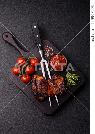 Chicken or turkey, poultry breast baked on the grill or barbecue. Grilled chicken 139907379