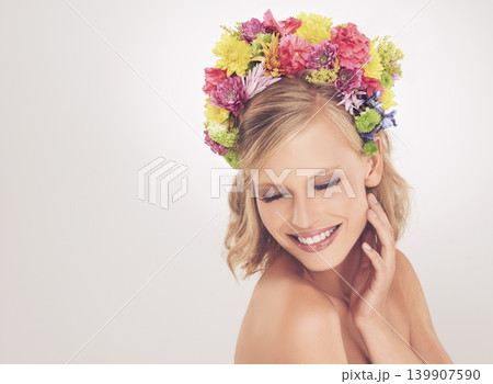 Woman, face and flowers on crown in studio with makeup and happiness for cosmetics, beauty and skincare. Spring aesthetic, model and floral headband with mockup space and wellness on white background Woman, face and flowers on crown in studio with makeup and happiness for cosmetics, beauty and skincare. Spring aesthetic, model and floral headband with mockup space and wellness on white background 139907590
