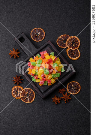 Candied fruit in colorful cubes as an ingredient for baked goods and sweets. Candied fruit 139907603
