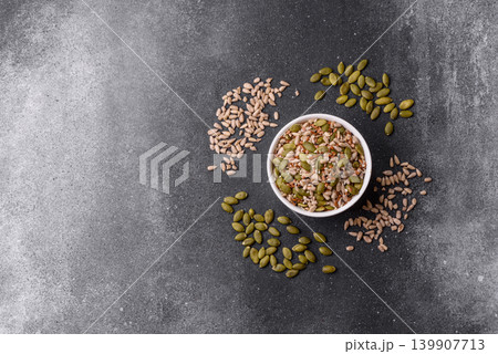 Shelled sunflower, sesame, pumpkin, and flaxseed kernels as ingredients for healthy food 139907713