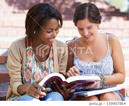 Studying, university and women on steps with books on campus for learning, knowledge and reading. Education, happy friends and students with textbook for information, exam preparation and college Studying, university and women on steps with books on campus for learning, knowledge and reading. Education, happy friends and students with textbook for information, exam preparation and college 139907864