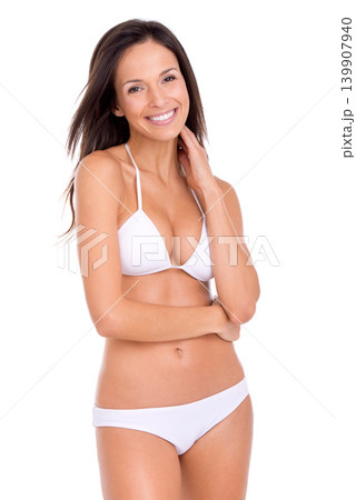 Happy woman, portrait and bikini for fashion and beauty with smile, swimwear style with cosmetics and skin on white background. Healthy glow, wellness with model in beach wear or underwear in studio Happy woman, portrait and bikini for fashion and beauty with smile, swimwear style with cosmetics and skin on white background. Healthy glow, wellness with model in beach wear or underwear in studio 139907940
