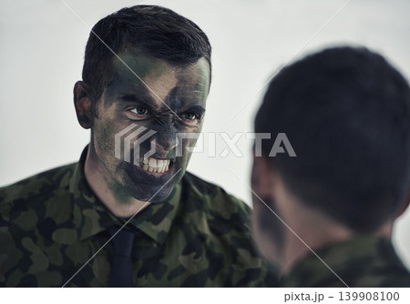 Soldier, man and mirror with camouflage for war with thinking, decision and anger to fight war. Person, agent or officer in military with reflection for choice, uniform and face paint for conflict Soldier, man and mirror with camouflage for war with thinking, decision and anger to fight war. Person, agent or officer in military with reflection for choice, uniform and face paint for conflict 139908100