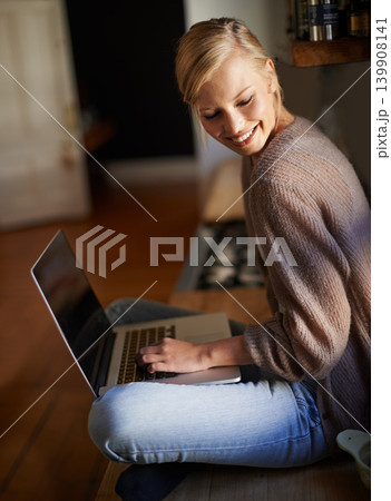 Remote work, laptop and happy woman in a house for research, planning or web communication. Freelance, smile and female person in living room with social media, blog or copywriting, project or task Remote work, laptop and happy woman in a house for research, planning or web communication. Freelance, smile and female person in living room with social media, blog or copywriting, project or task 139908141