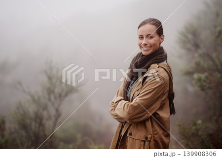 Travel, portrait and happy woman with arms crossed in nature for hiking, wellness or walk outdoor in winter. Face, pride person outdoor for fresh air, camping or adventure, journey or campsite fun 139908306