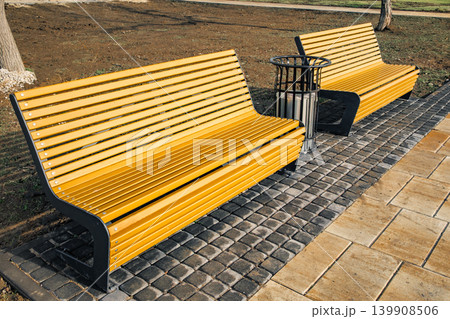 benches and urn in park in recreation area benches and urn in park in recreation area 139908506