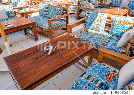 tables and sofas in an outdoor cafe 139908526