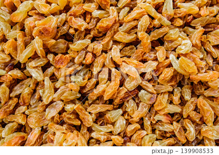 light raisins, dried grapes close-up light raisins, dried grapes close-up 139908533
