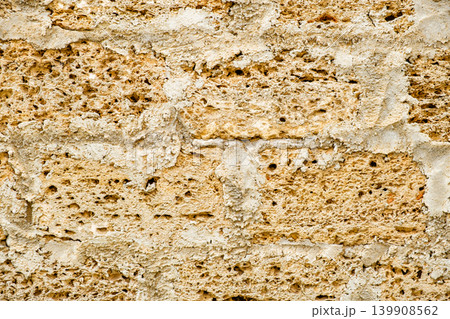 background of porous stone masonry close-up 139908562