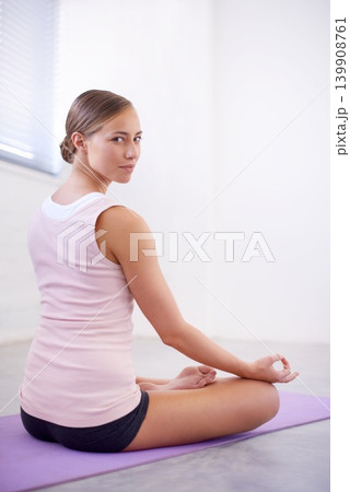 Portrait, meditation and woman in lotus pose on yoga mat with zen, balance and spiritual peace. Tranquility, mindfulness and girl on floor with quiet focus, breathing exercise and calm chakra energy. Portrait, meditation and woman in lotus pose on yoga mat with zen, balance and spiritual peace. Tranquility, mindfulness and girl on floor with quiet focus, breathing exercise and calm chakra energy. 139908761